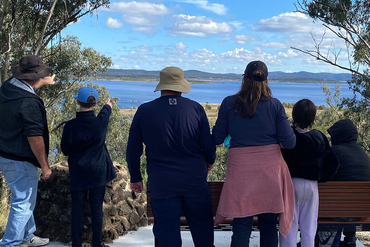 The Co-operative Life group photo of team looking over Lake Illawarra